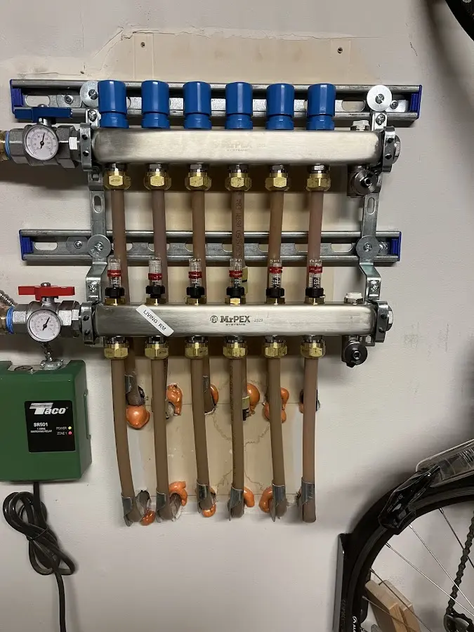 Plumber performing Water Heater Repair at a residential property in Blountville